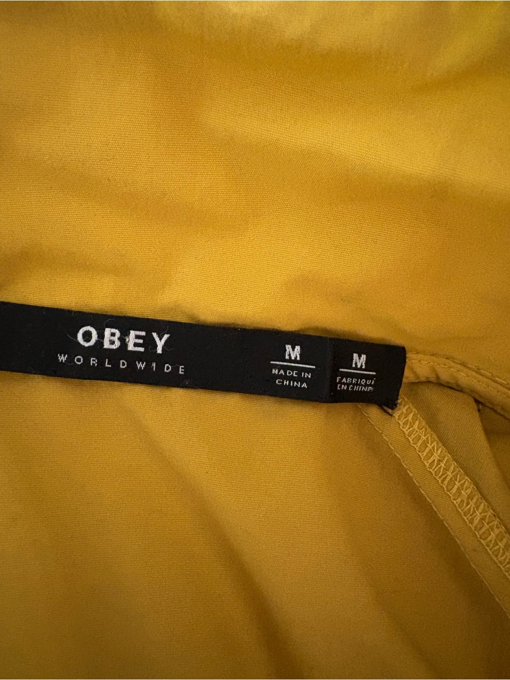 Obey Men's Mustard Yellow Windbreaker with Black Branded Shoulder Tape - Picture 3 of 3
